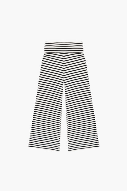 Black and white striped foldover pants on a white background